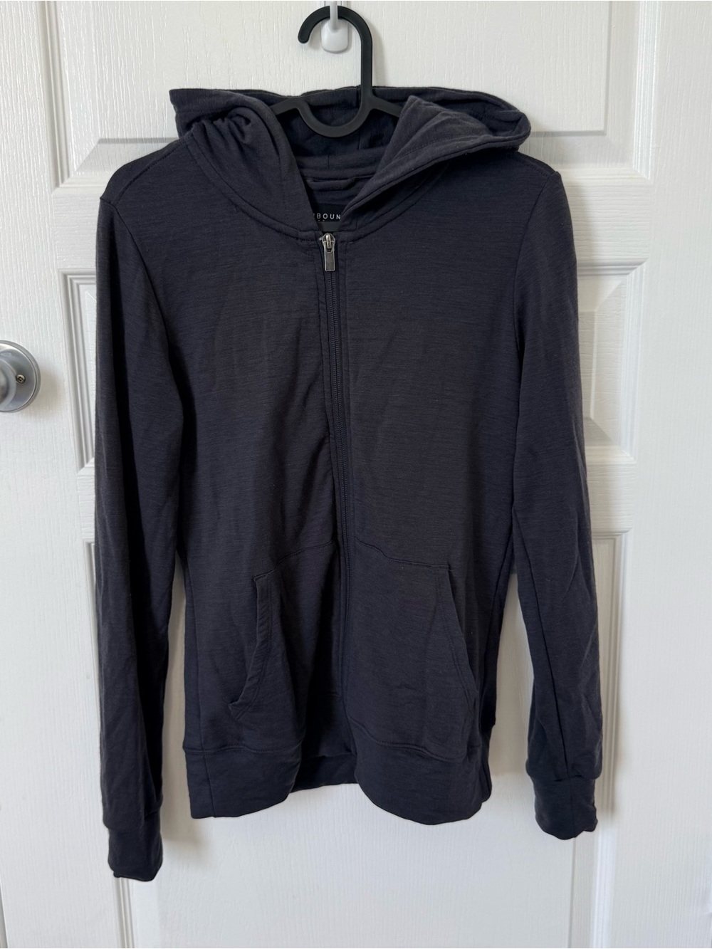 Unbound Merino Women's Compact Travel Hoodie in Heather Charcoal/Black Size XS